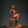 Zdjęcie Chained Girl Sitting on Ammo Box